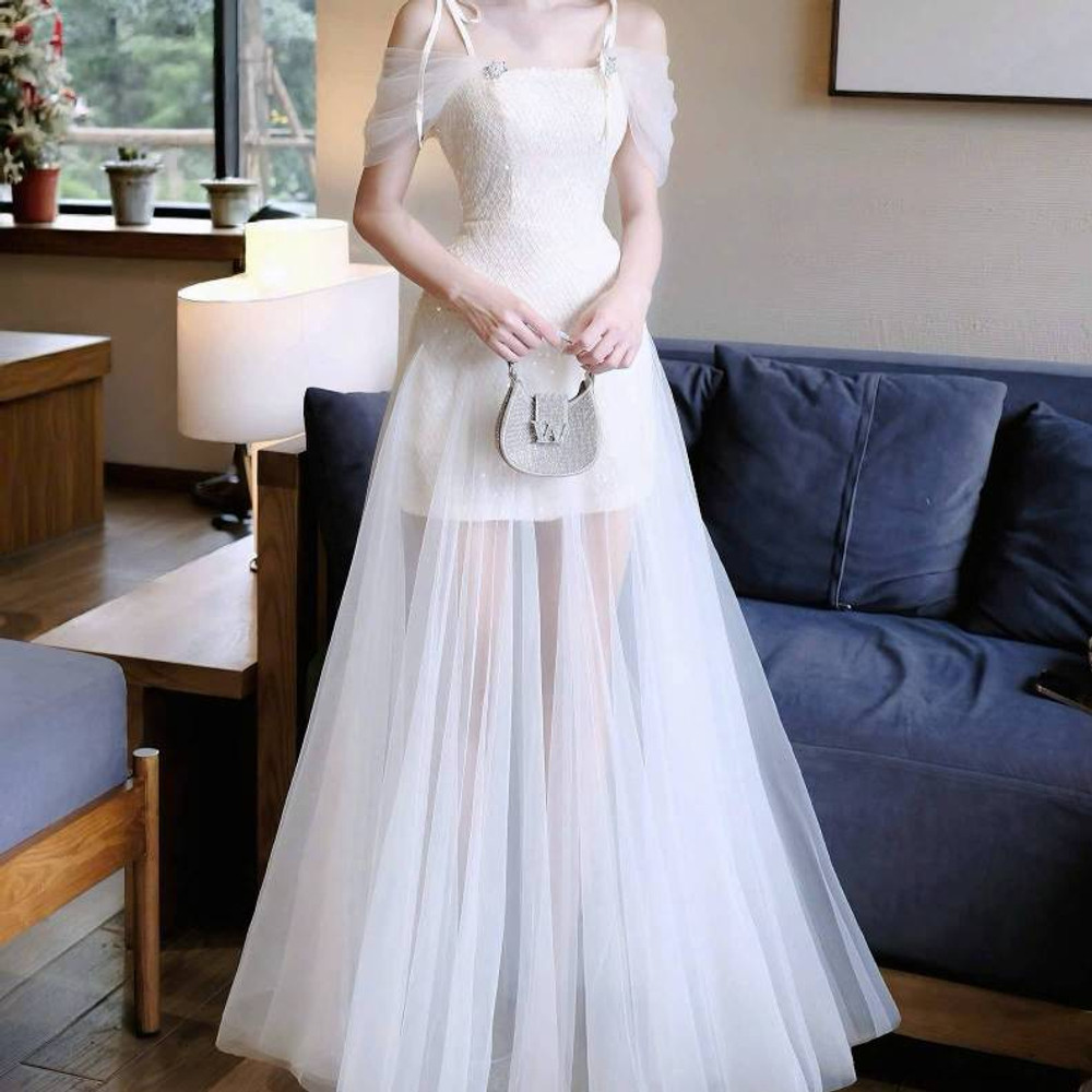 Đầm thiết kế voan 2 dây tùng dài