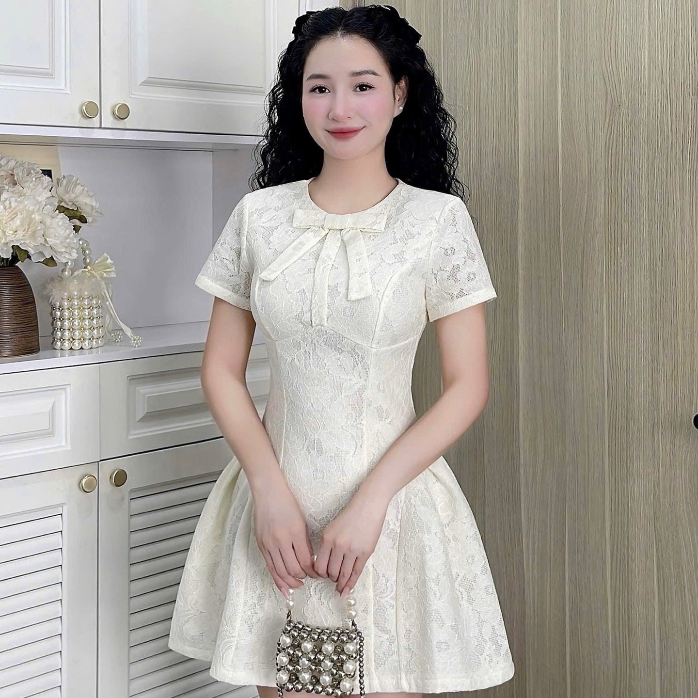 Đầm thiết kế cổ tròn nơ dáng A xoè ngắn