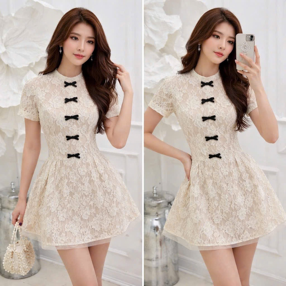 Đầm thiết kế thêu ren nơ dọc