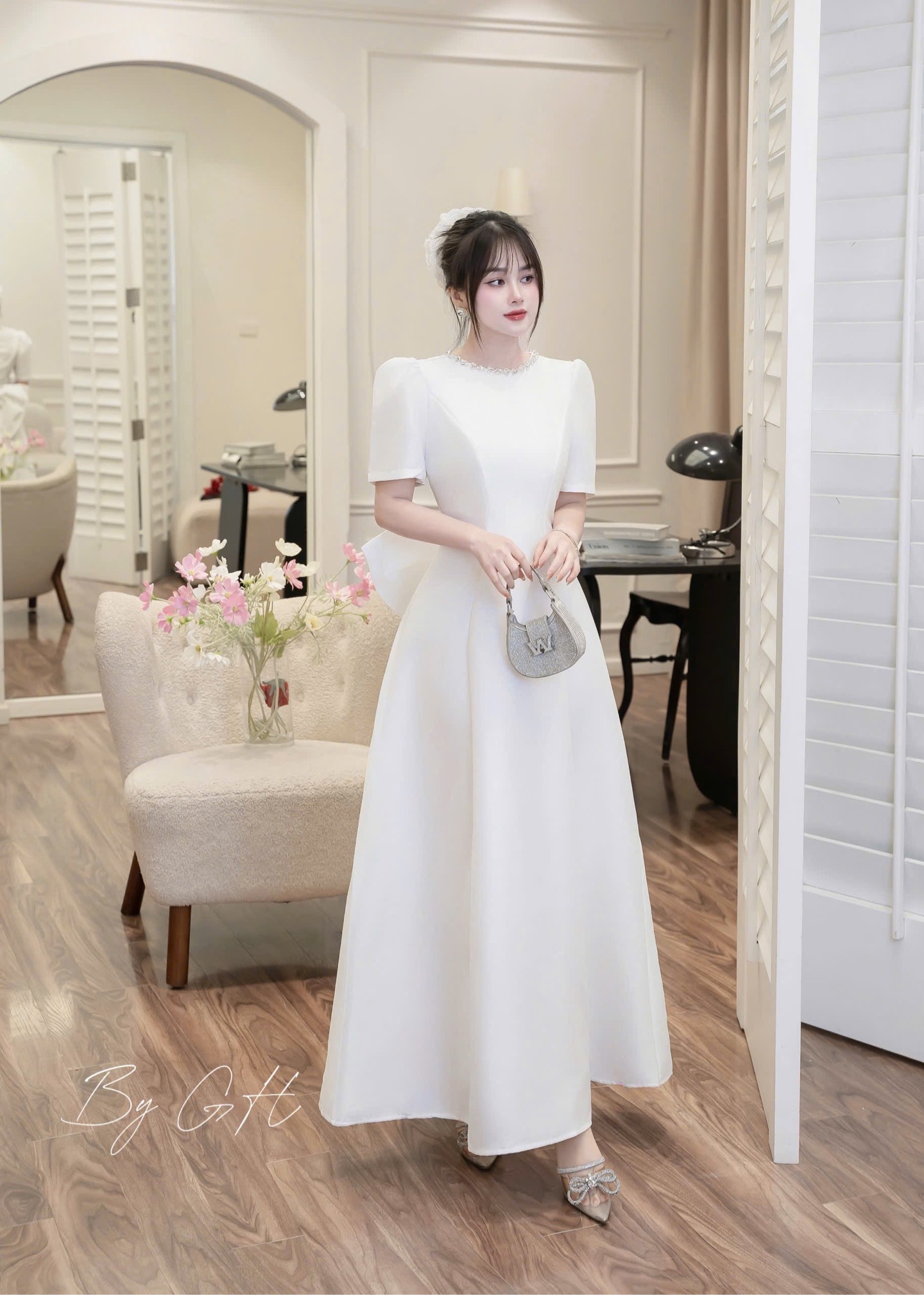 Đầm trắng xoè nơ sau cao cấp H