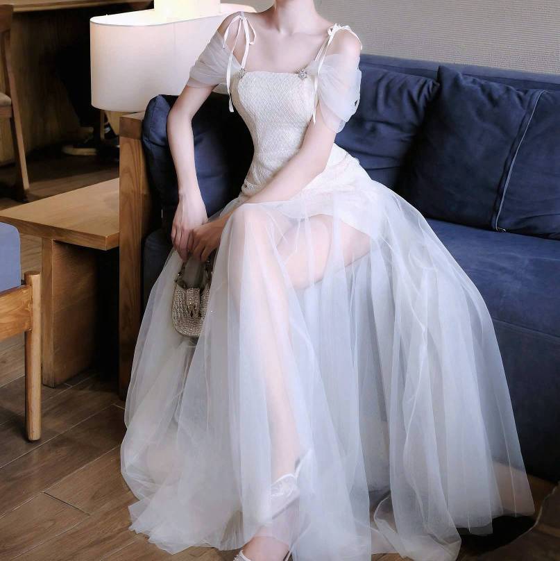 Đầm thiết kế voan 2 dây tùng dài
