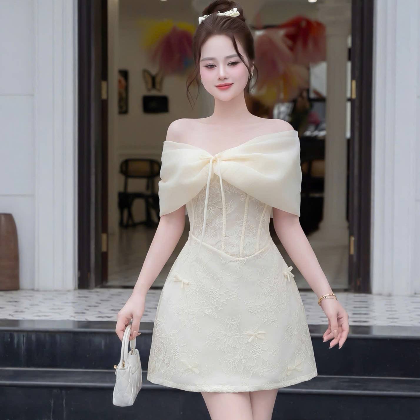 Đầm thiết kế trễ vai nơ ngực