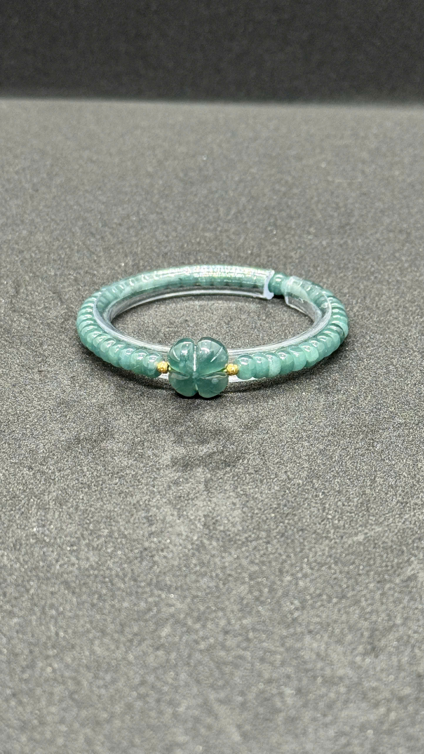 Vòng lam ngọc bánh xe mix cỏ 4 lá