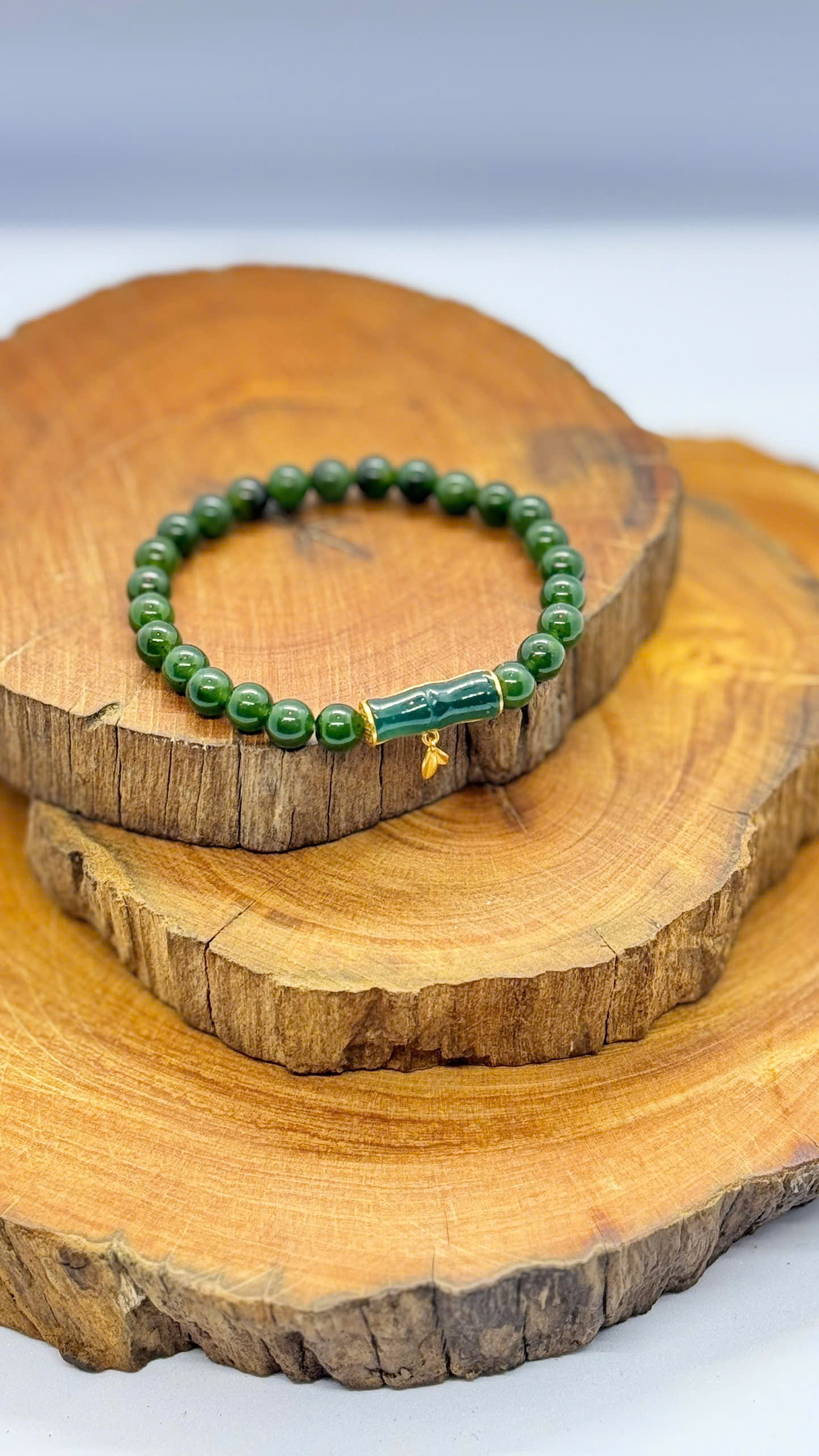 Vòng tay ngọc bích 6mm ít ruồi mix charm trúc bạc mạ vàng