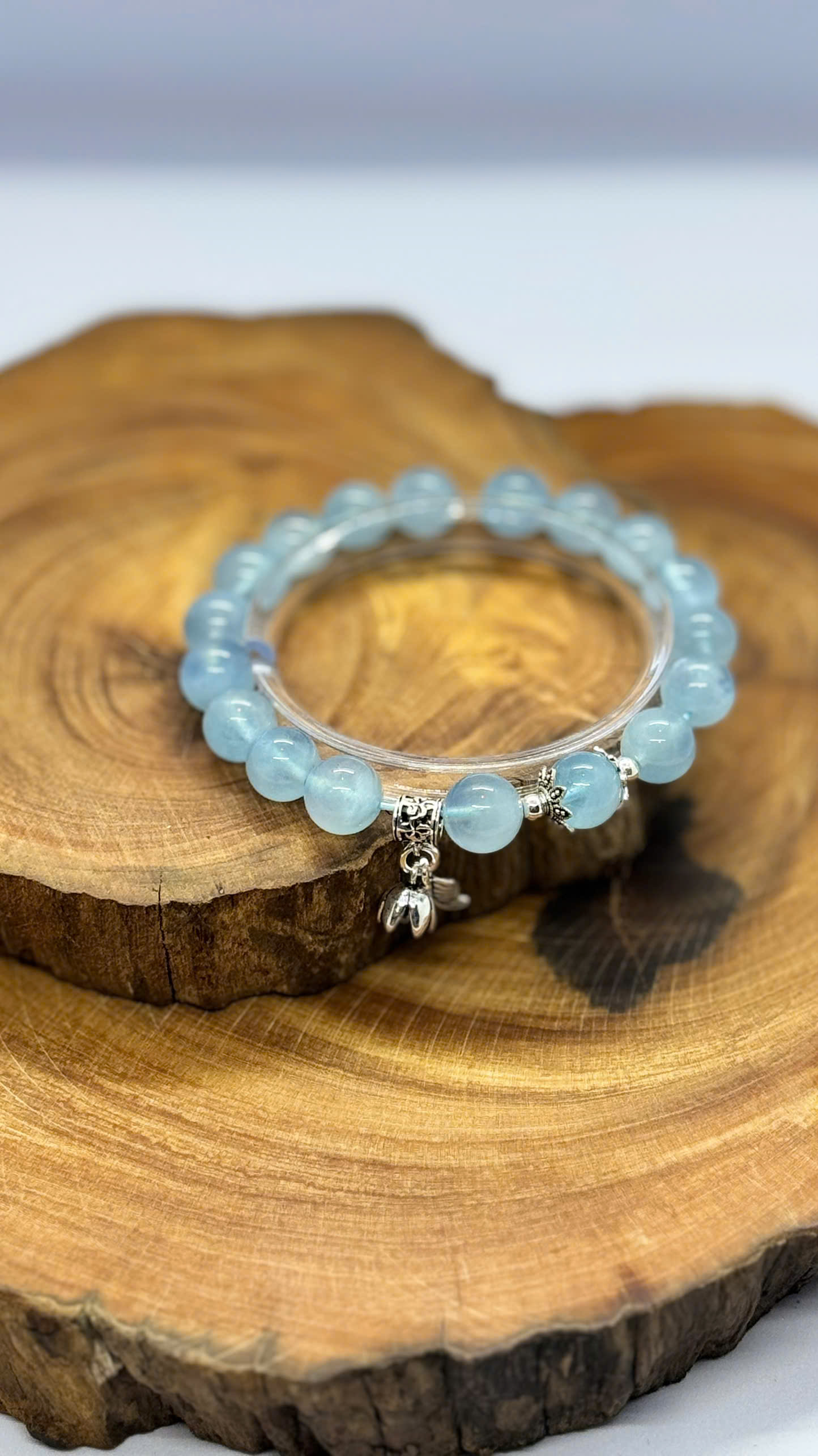 Vòng tay Aquamarine 3A 9mm mix charm bạc 925