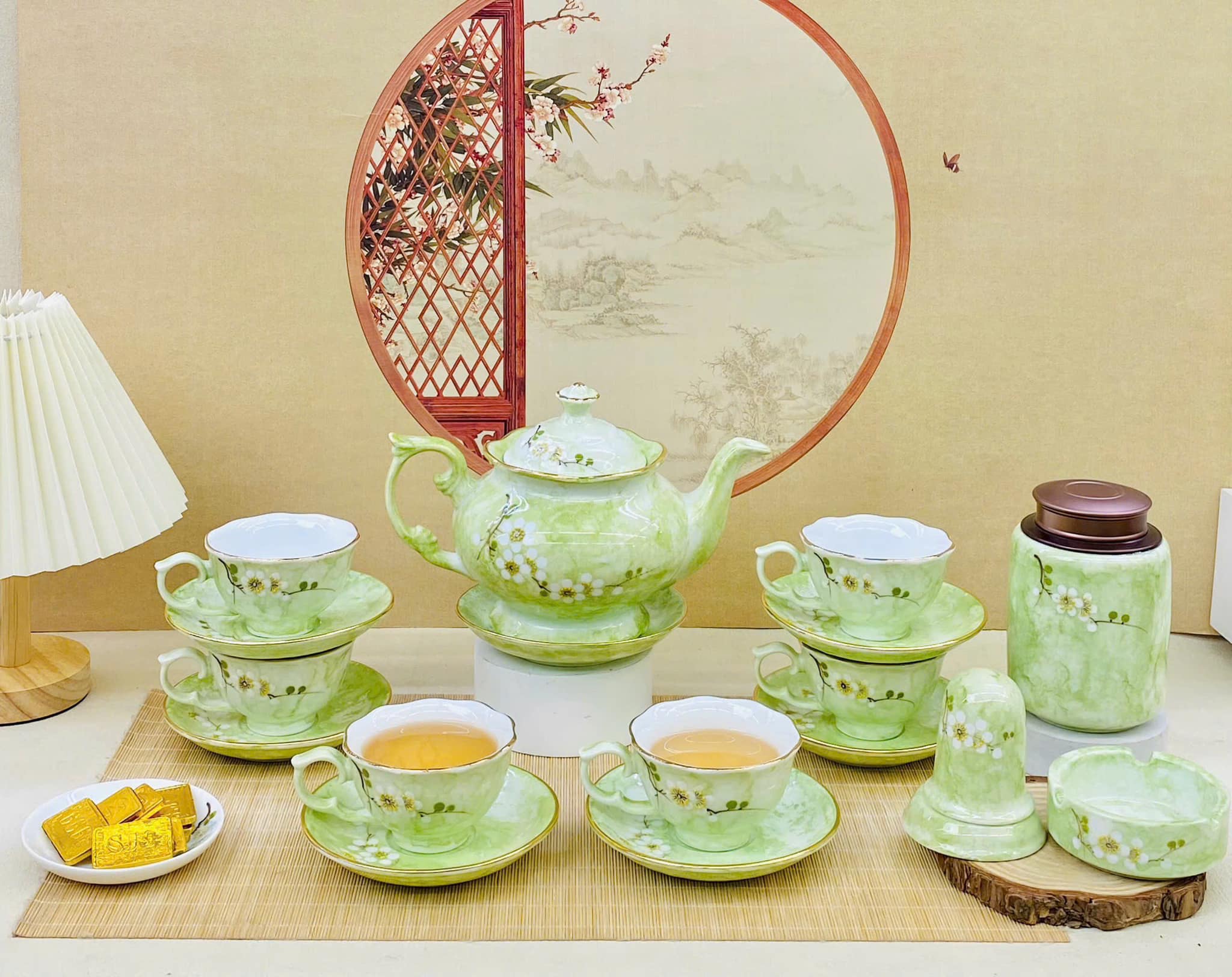 Bộ ấm chén men vân đá vẽ hoa