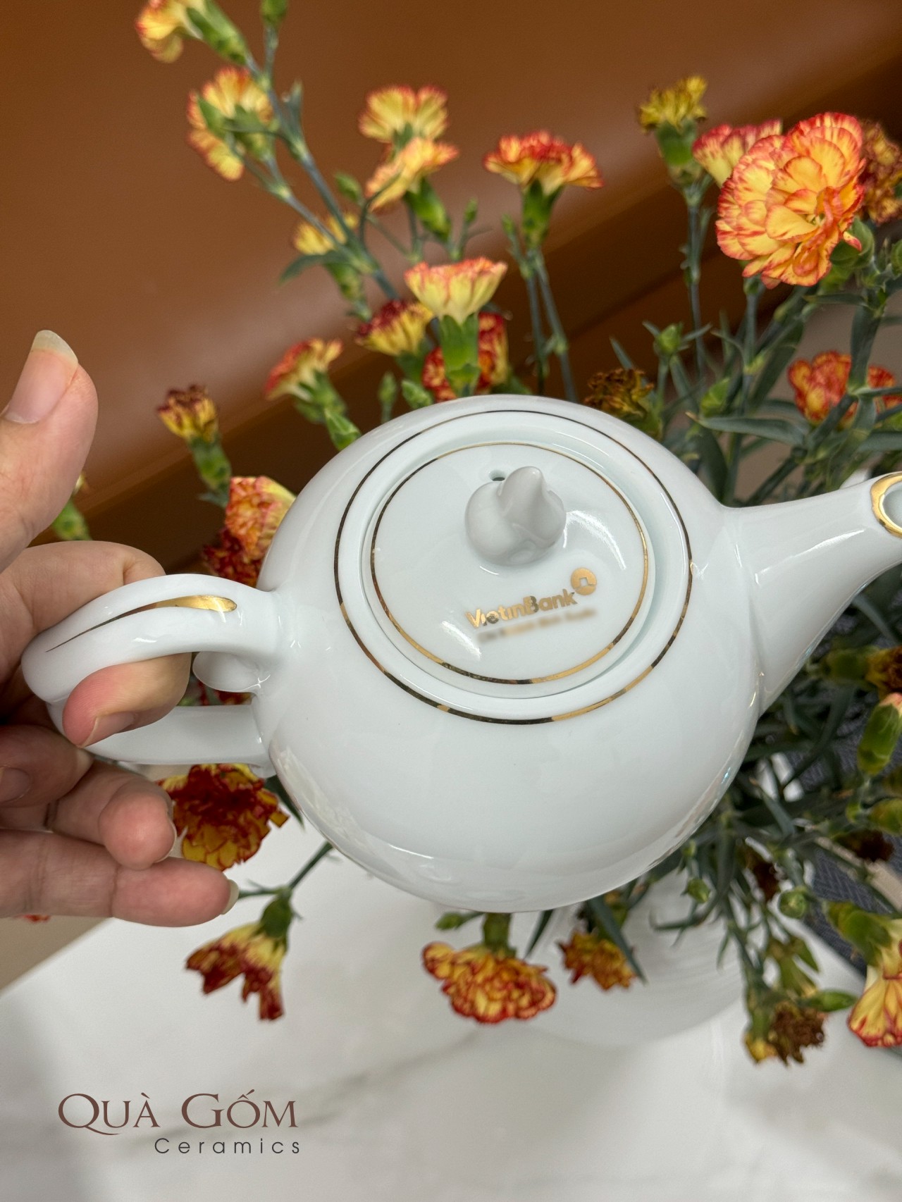 Bộ ấm chén trắng viền vàng Vietinbank