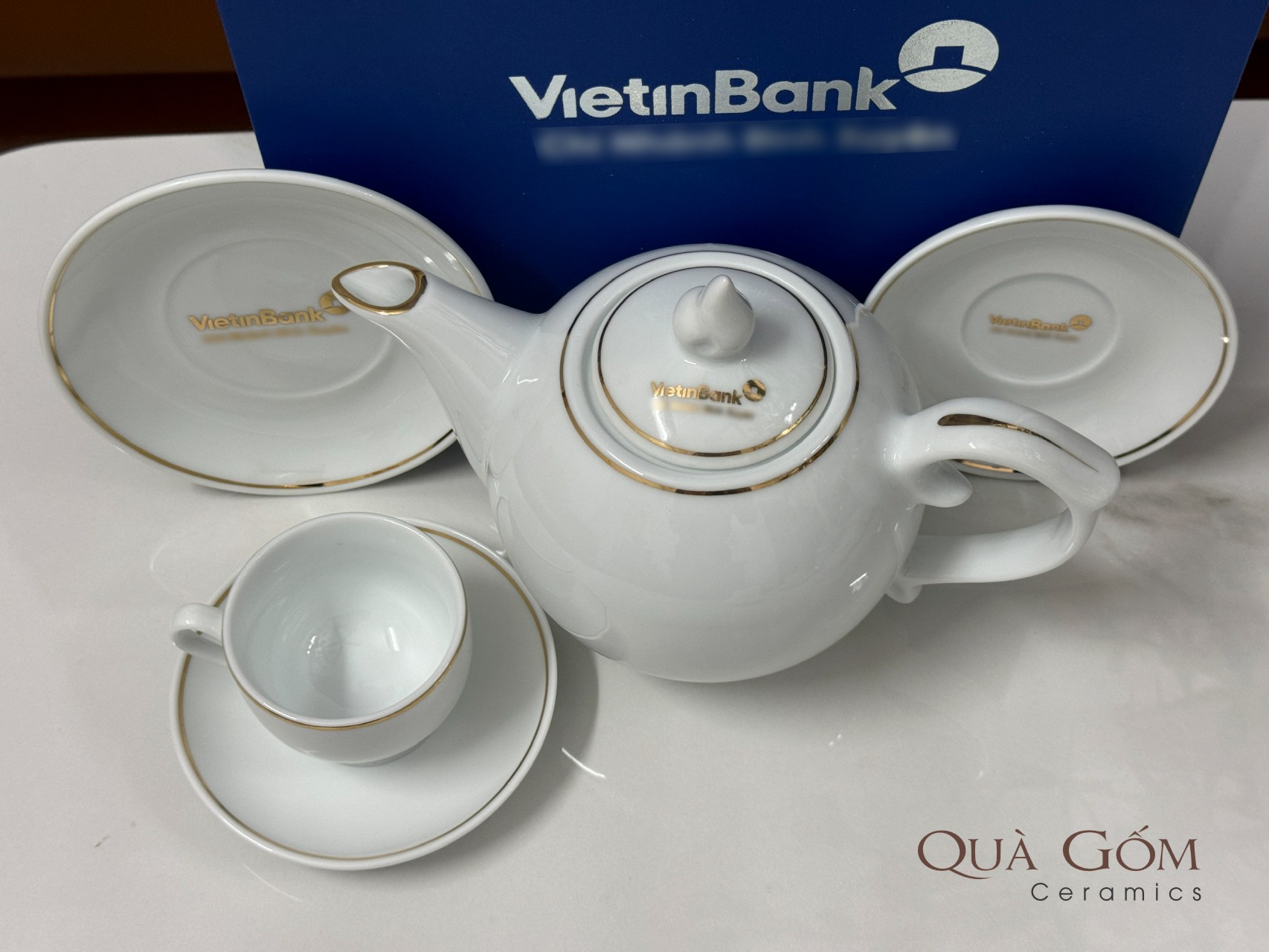 Bộ ấm chén trắng viền vàng Vietinbank