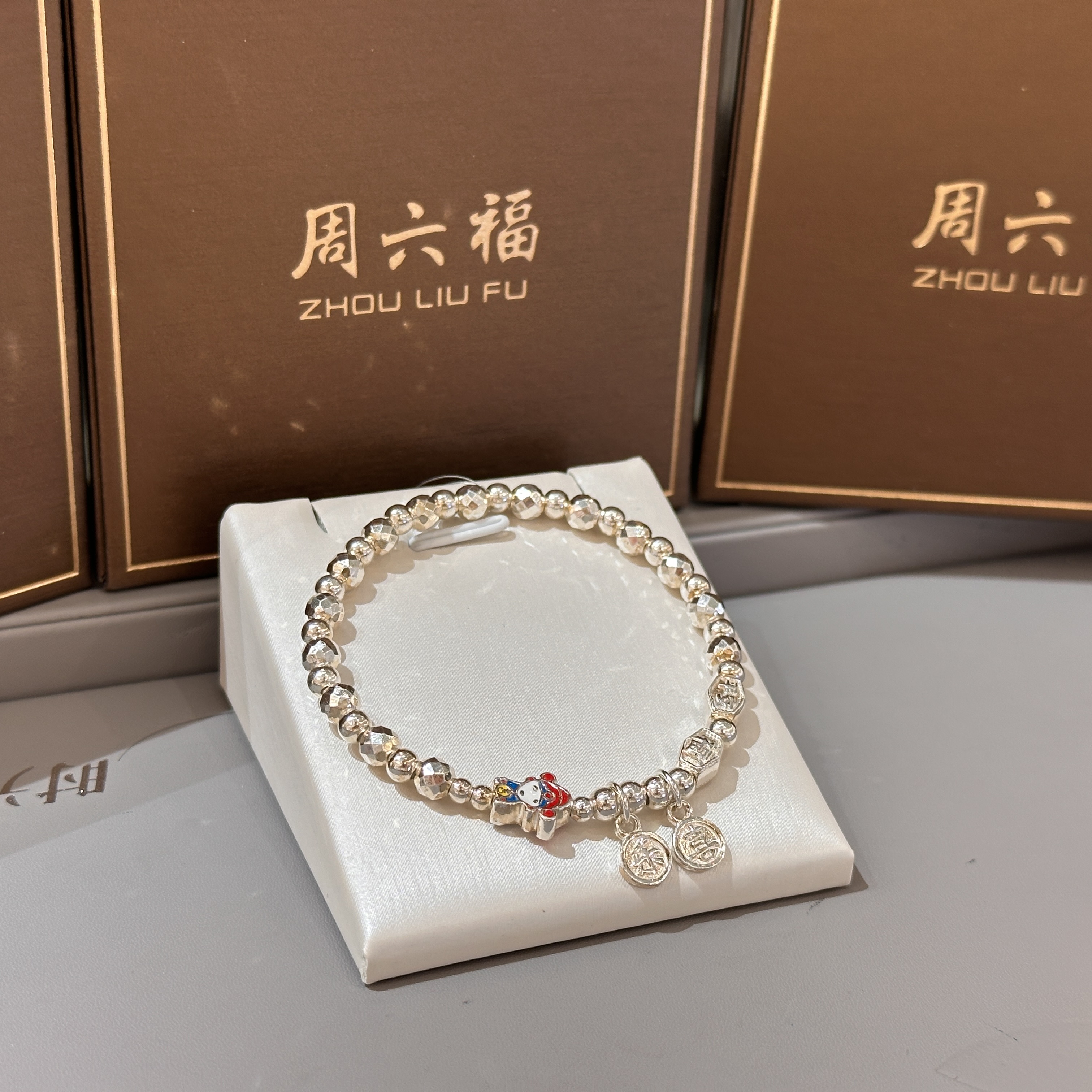 Vòng Tay Bạc Cách Điệu Phối Charm Thần Tài - Tài Lộc