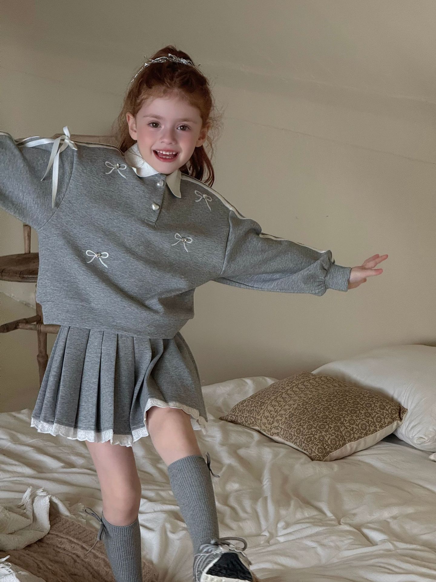 SN Áo Váy Xám Nơ Đá Ota