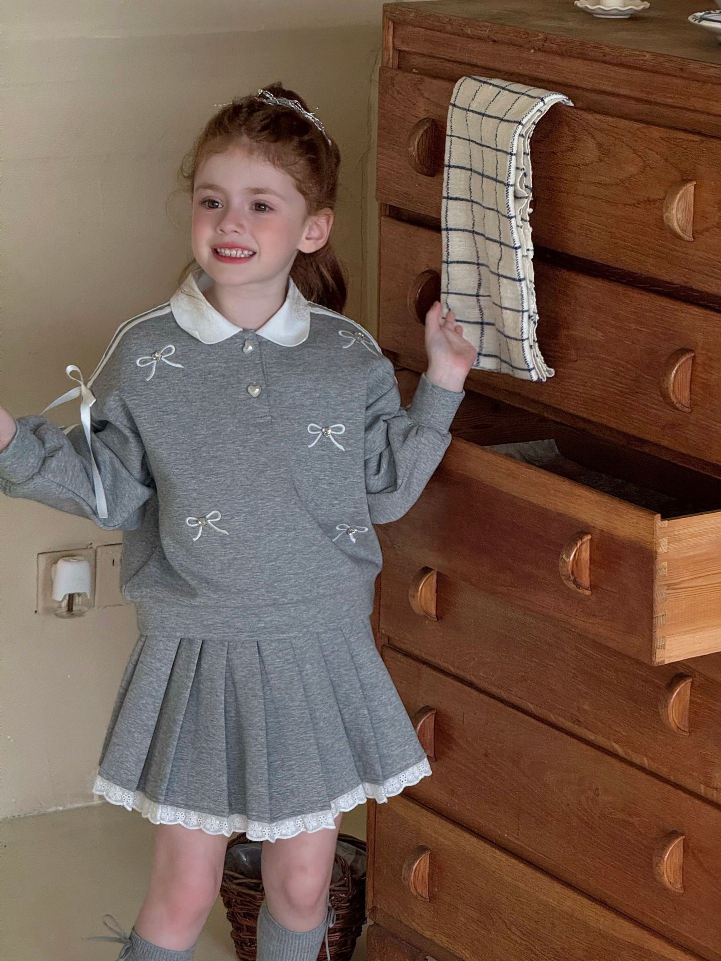 SN Áo Váy Xám Nơ Đá Ota