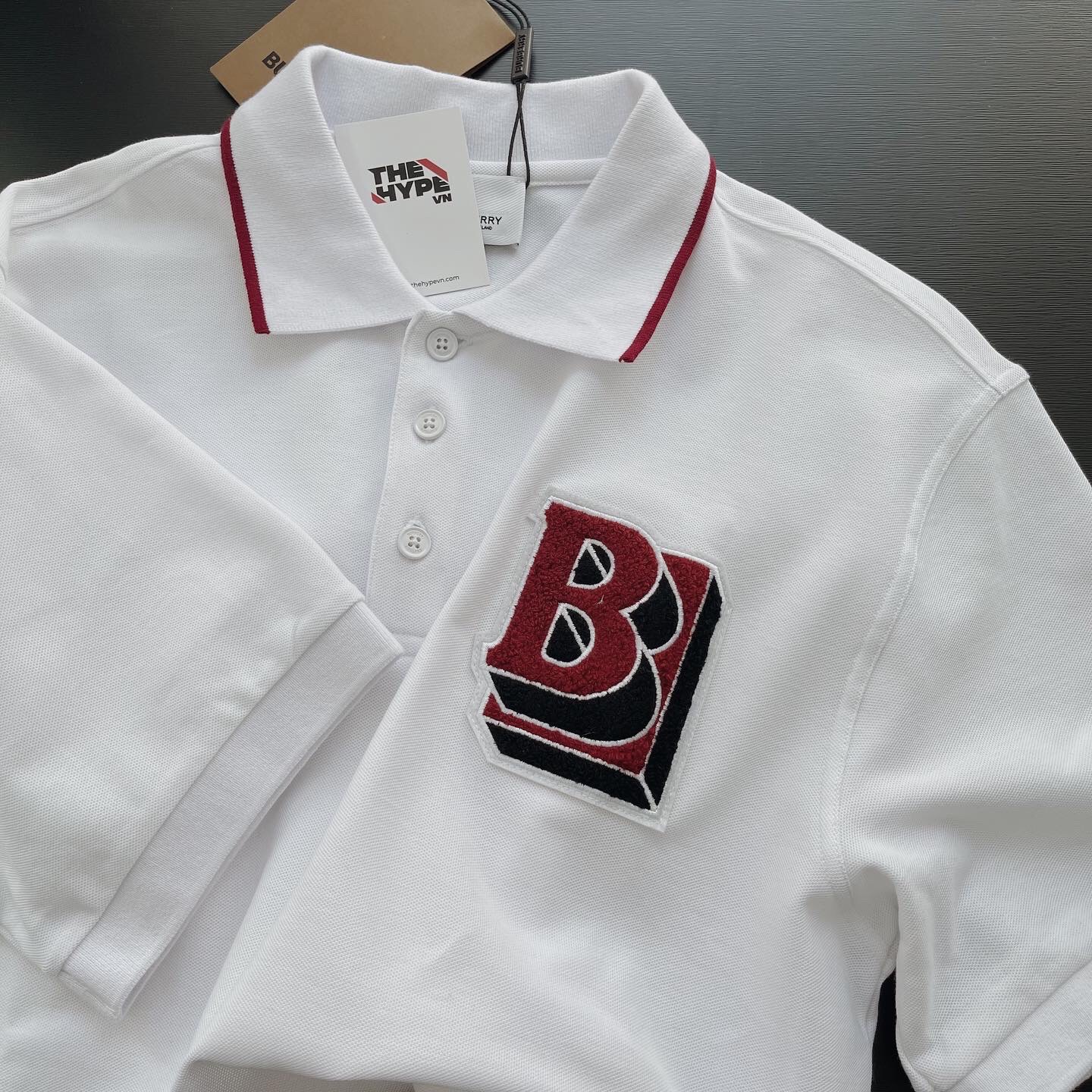 Áo Polo Burberry Letter Graphic Cotton Oversized (White) [Mirror Quality]