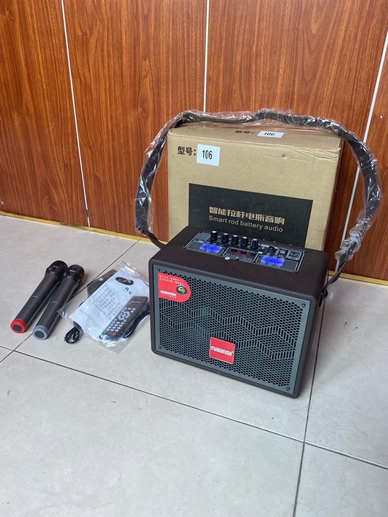 Loa karaoke Malanda 106 kèm 2 micro kim loại chống hú xách tay cực hay [BH 6 tháng]