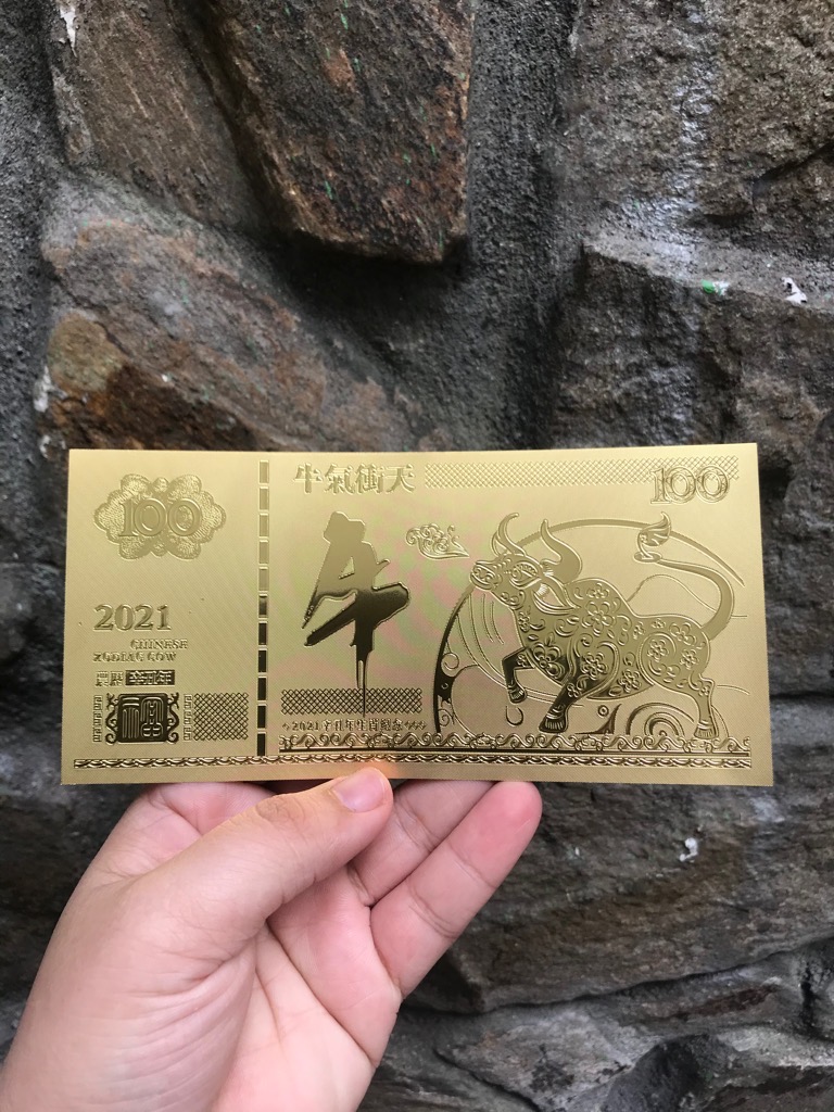 Tiền lưu niệm tờ 100 plastic vàng hình con Trâu Tết / pktn sale