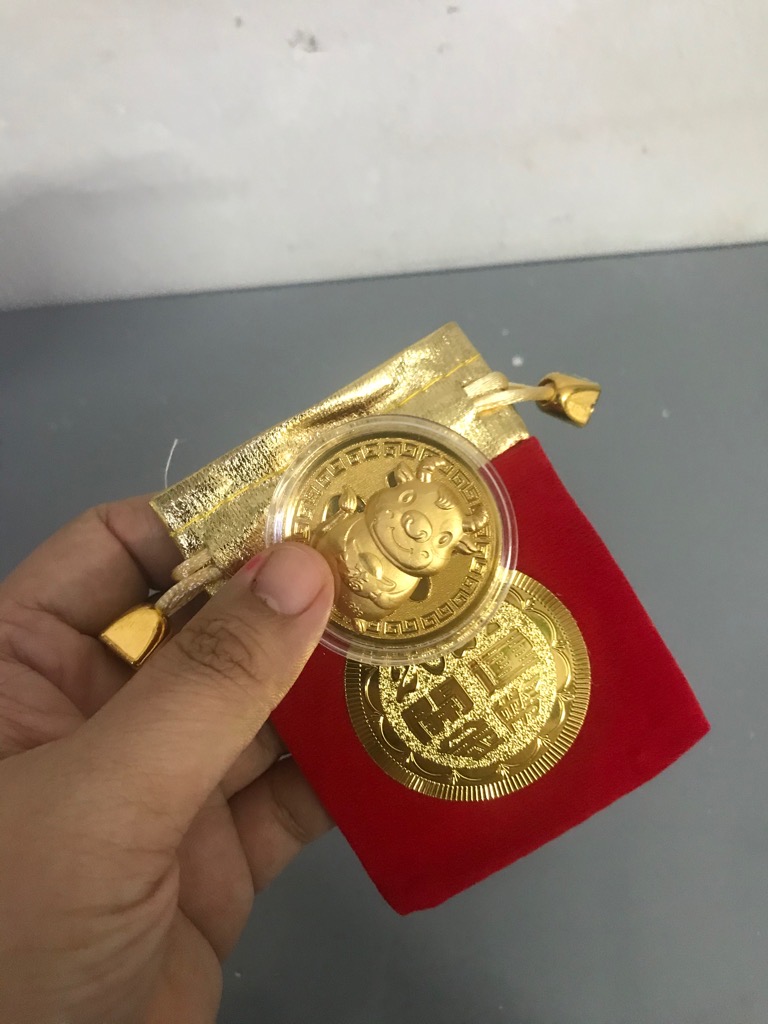 Hàng Lưu Niệm Đồng Xu Trâu Vàng kèm Túi Đựng / pktn sale