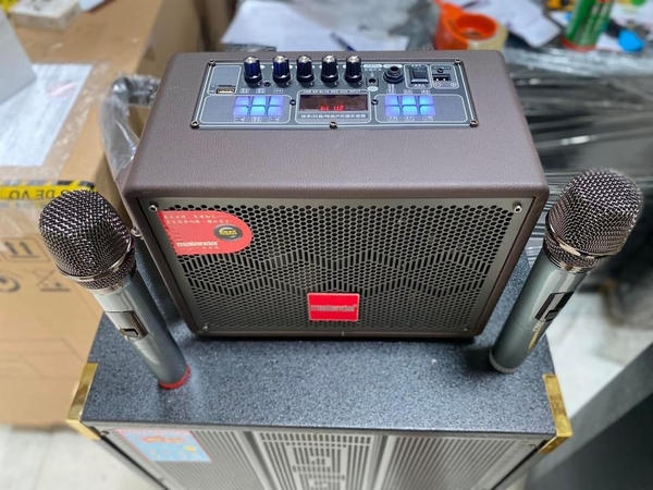 Loa karaoke Malanda 106 kèm 2 micro kim loại chống hú xách tay cực hay [BH 6 tháng]