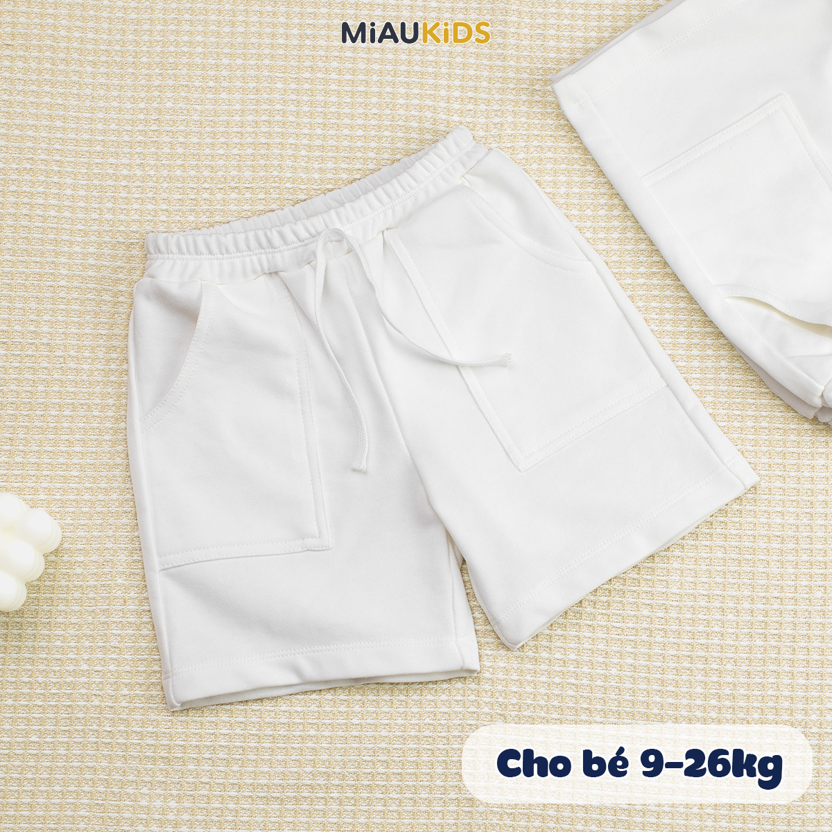 Quần đùi trắng bé trai cotton co giãn có túi thun mềm mát đi học chơi