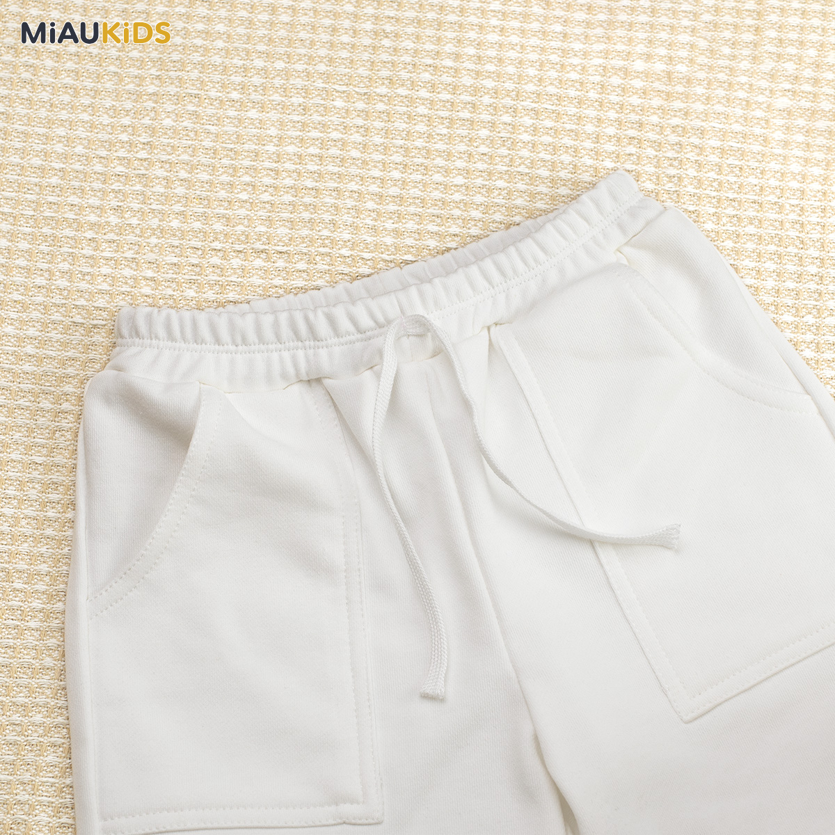 Quần đùi trắng bé trai cotton co giãn có túi thun mềm mát đi học chơi