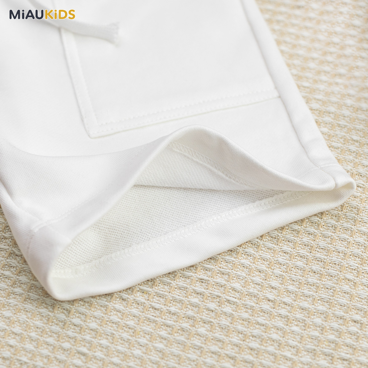 Quần đùi trắng bé trai cotton co giãn có túi thun mềm mát đi học chơi