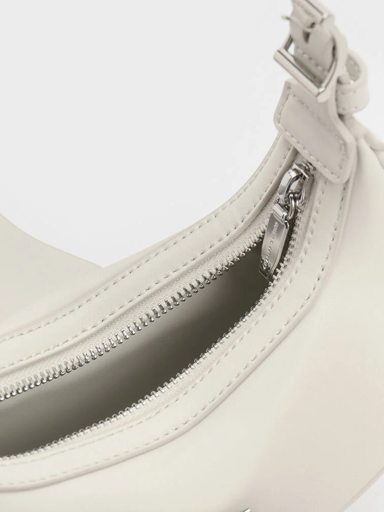 Trice Metallic Accent Belted Curved Shoulder Bag