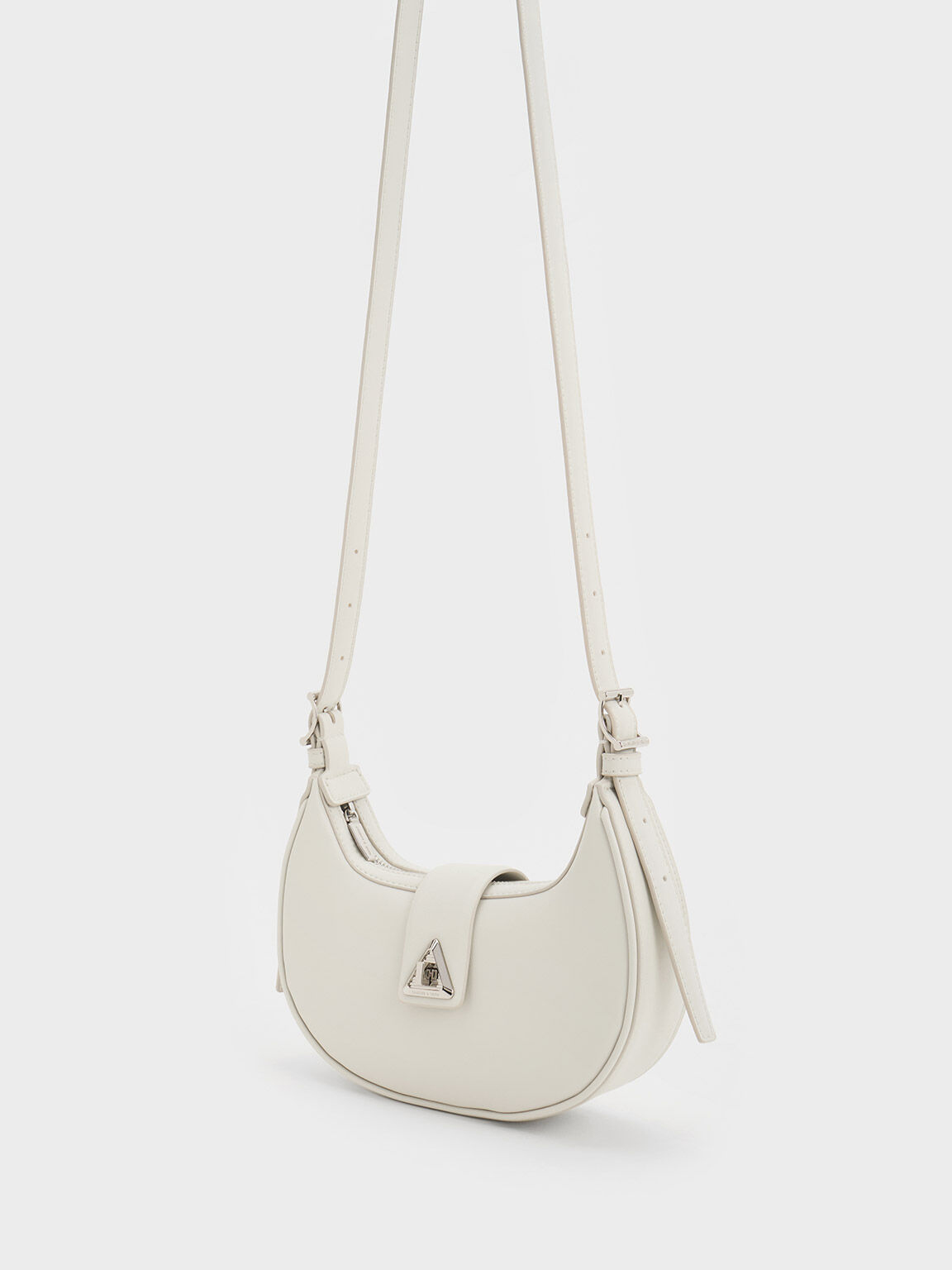 Trice Metallic Accent Belted Curved Shoulder Bag
