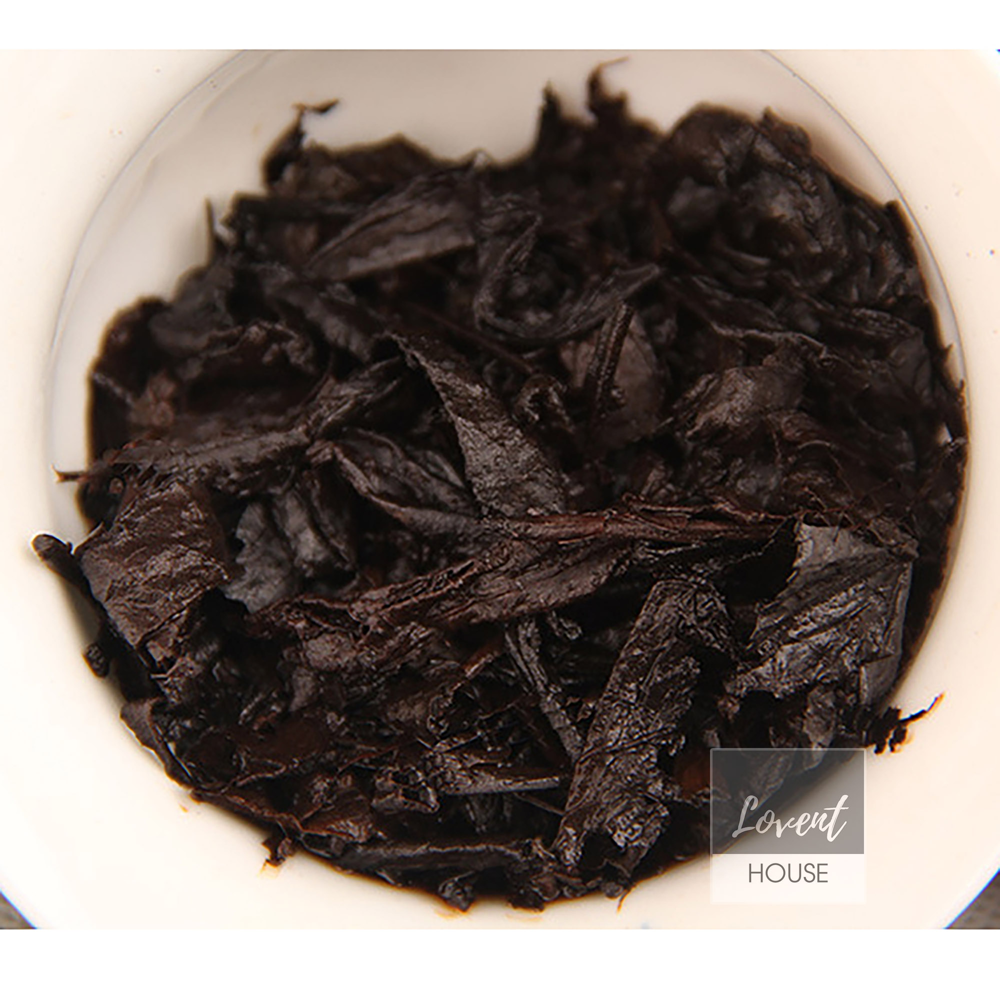 Trà Phổ Nhĩ Thất Tử Thục Trà Bát Niên Trần Vận bánh 357g