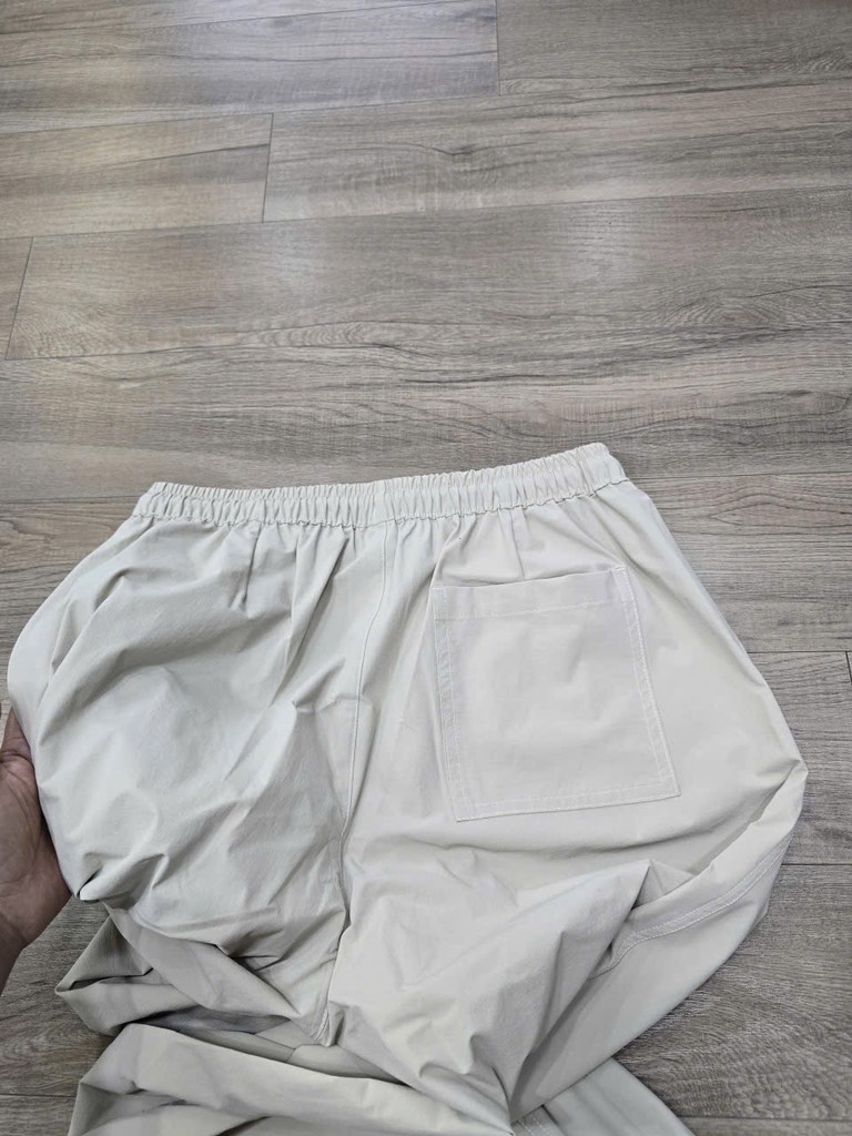 QE35 Quần gió nữ U