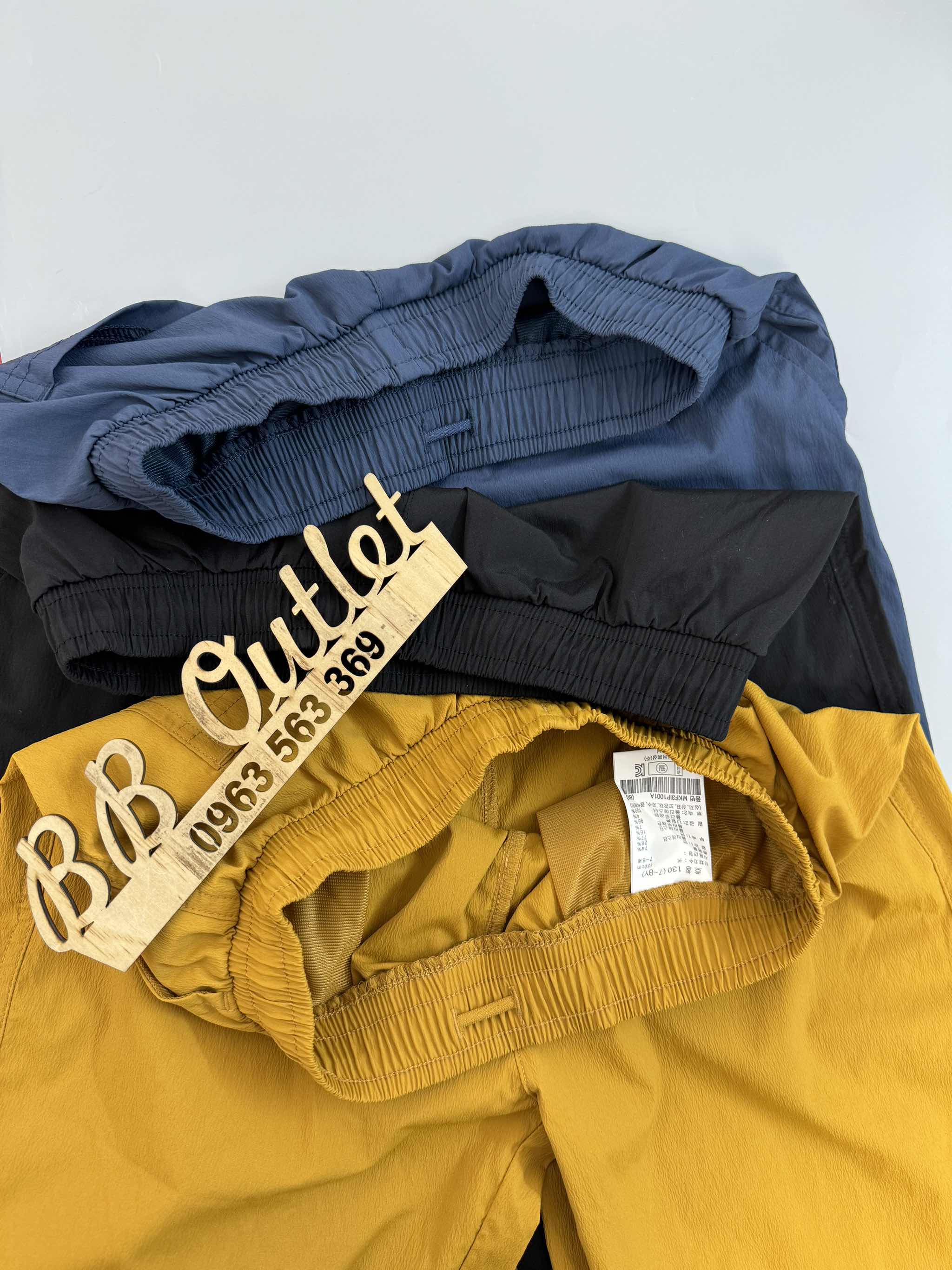 Q48 Quần đùi gió Topten