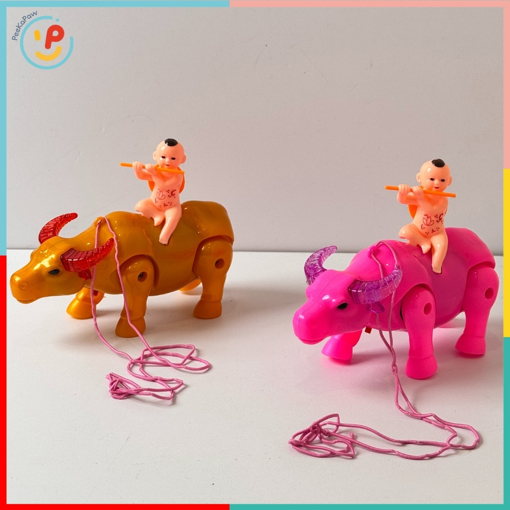 Đồ chơi Chú bé chăn Trâu dắt Trâu chạy xung quanh dây cột có nhạc và đèn PeeKaPaw Toys