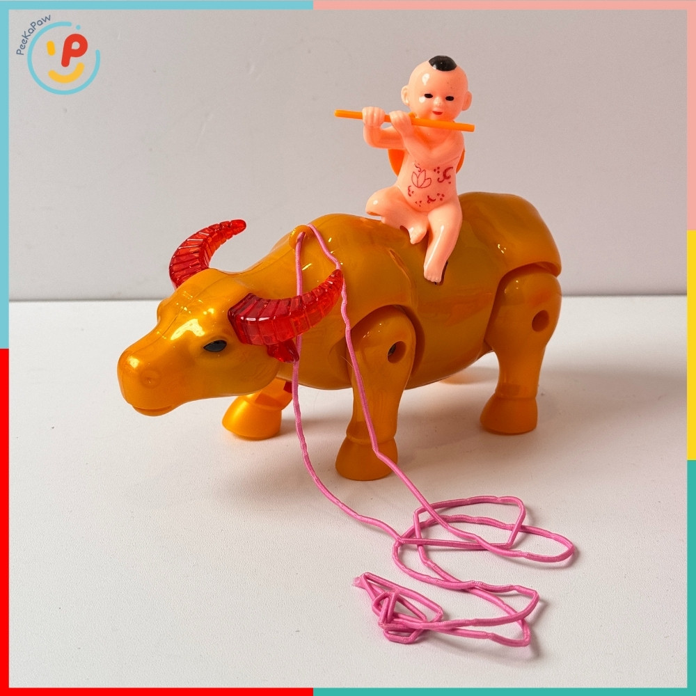 Đồ chơi Chú bé chăn Trâu dắt Trâu chạy xung quanh dây cột có nhạc và đèn PeeKaPaw Toys
