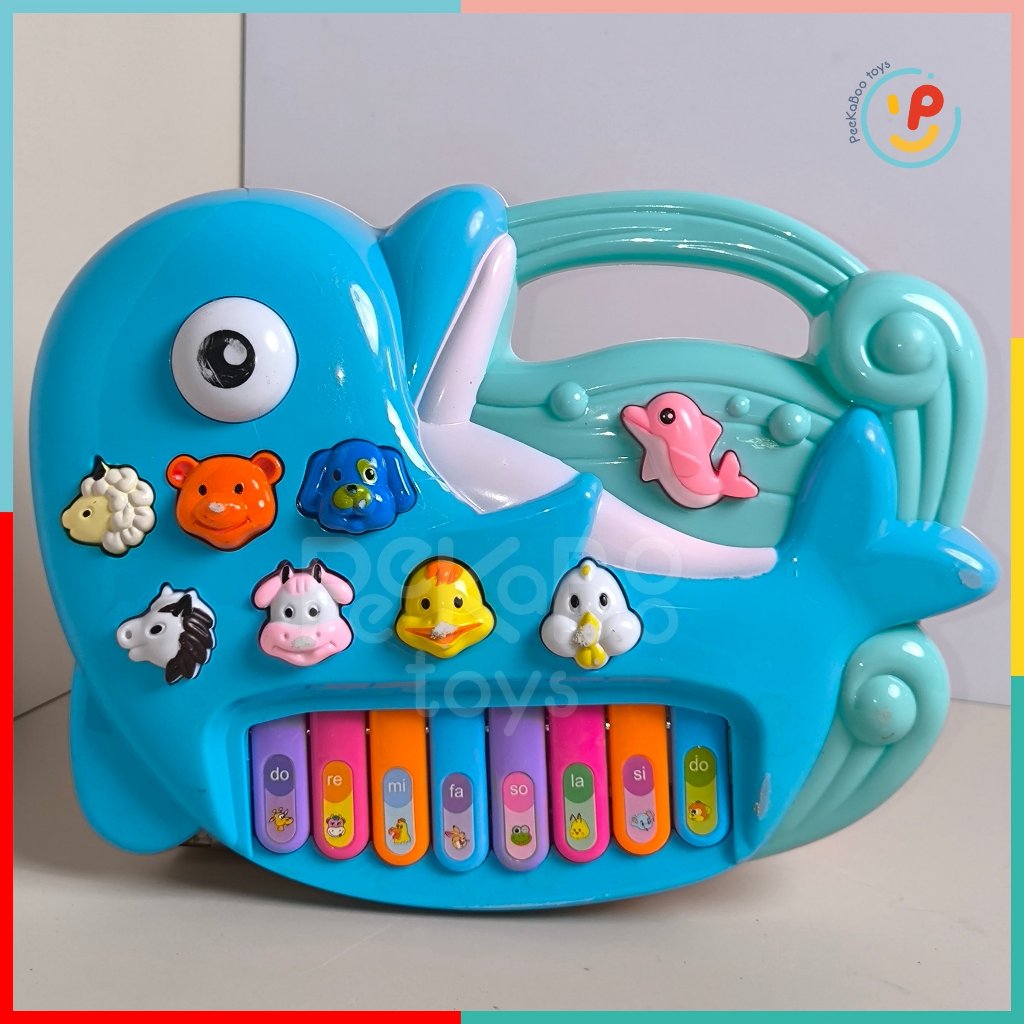 Đồ chơi đàn piano hình cá heo có đèn và âm thanh tiếng kêu động vật Peekabootoys