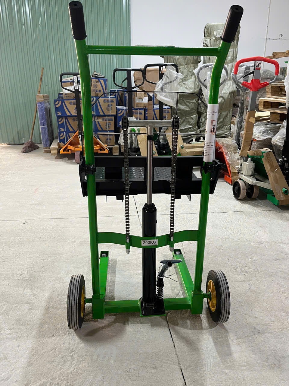 Xe nâng cao mini 200kg - 90cm nhãn hiệu Haniko màu xanh