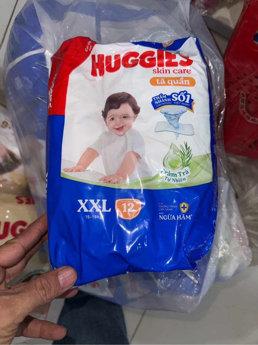 TA QUAN HUGGIES XXL 12 MIENG