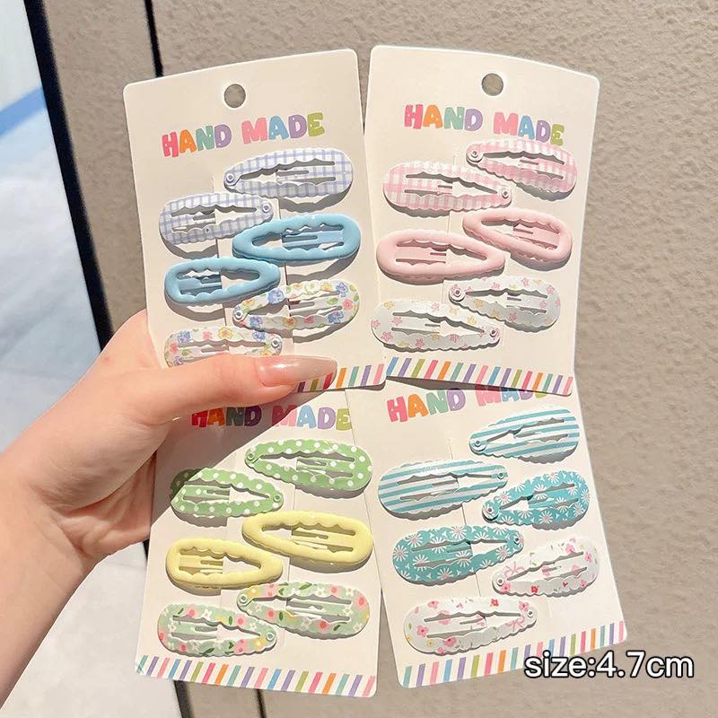 Vỉ 6 kẹp nhiều họa tiết tha hồ làm điệu cho bé gái (giao ngẫu nhiên)