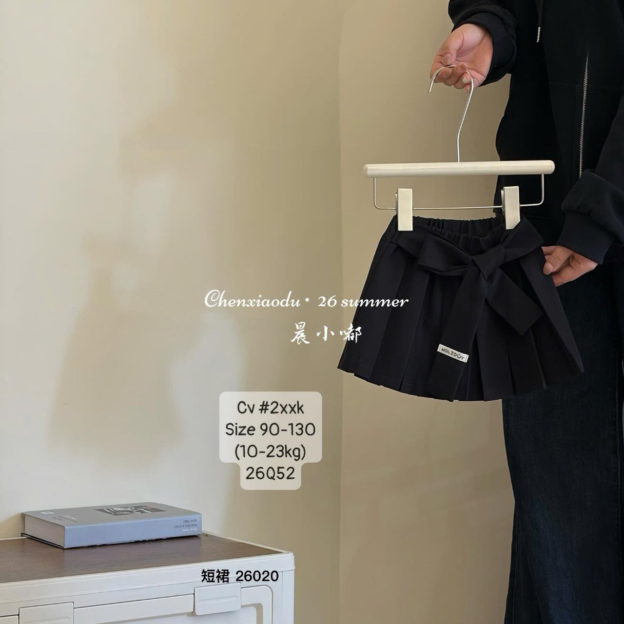 Chân váy xếp li phối nơ điệu đà