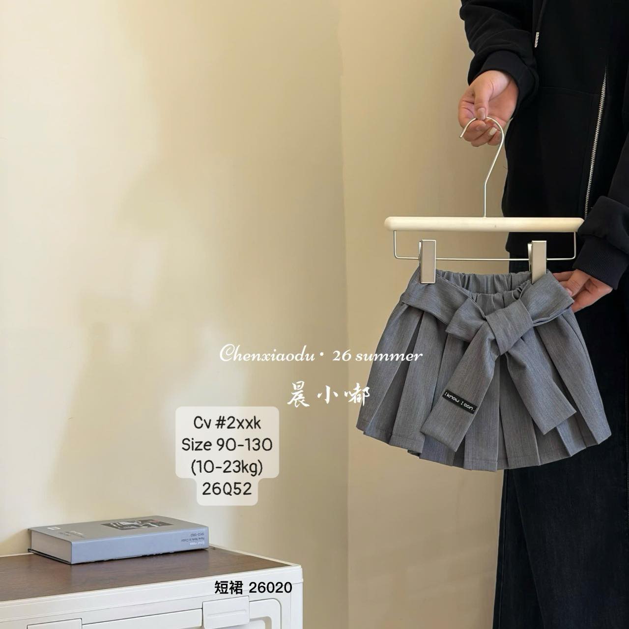 Chân váy xếp li phối nơ điệu đà