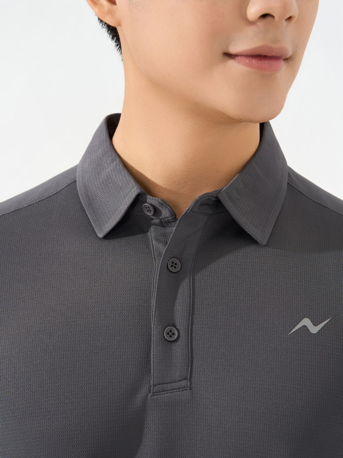 Áo Polo Xẻ Gấu Thoáng Khí