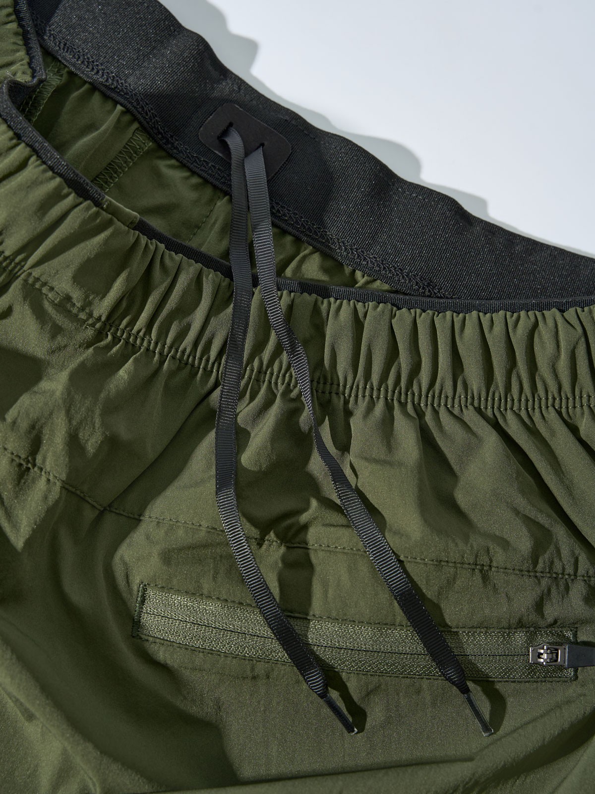 Quần Shorts Gió Thể Thao Nam Chun Ẩn