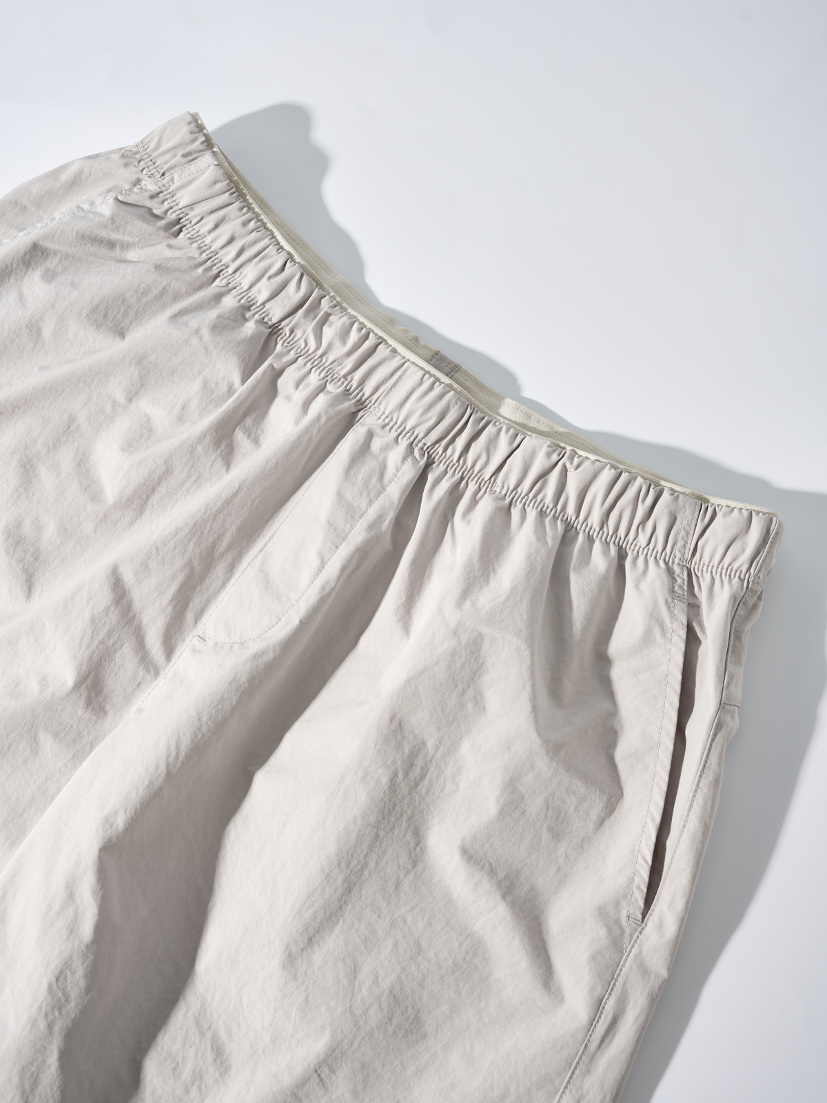 Quần Shorts Gió Thể Thao Nam Chun Ẩn