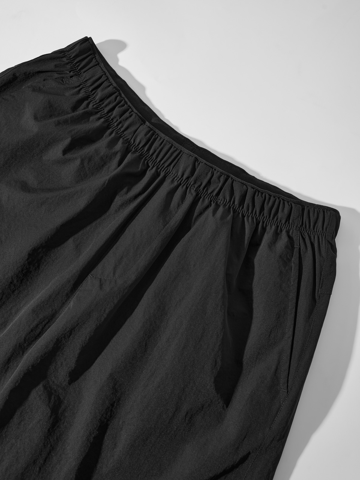 Quần Shorts Gió Thể Thao Nam Chun Ẩn