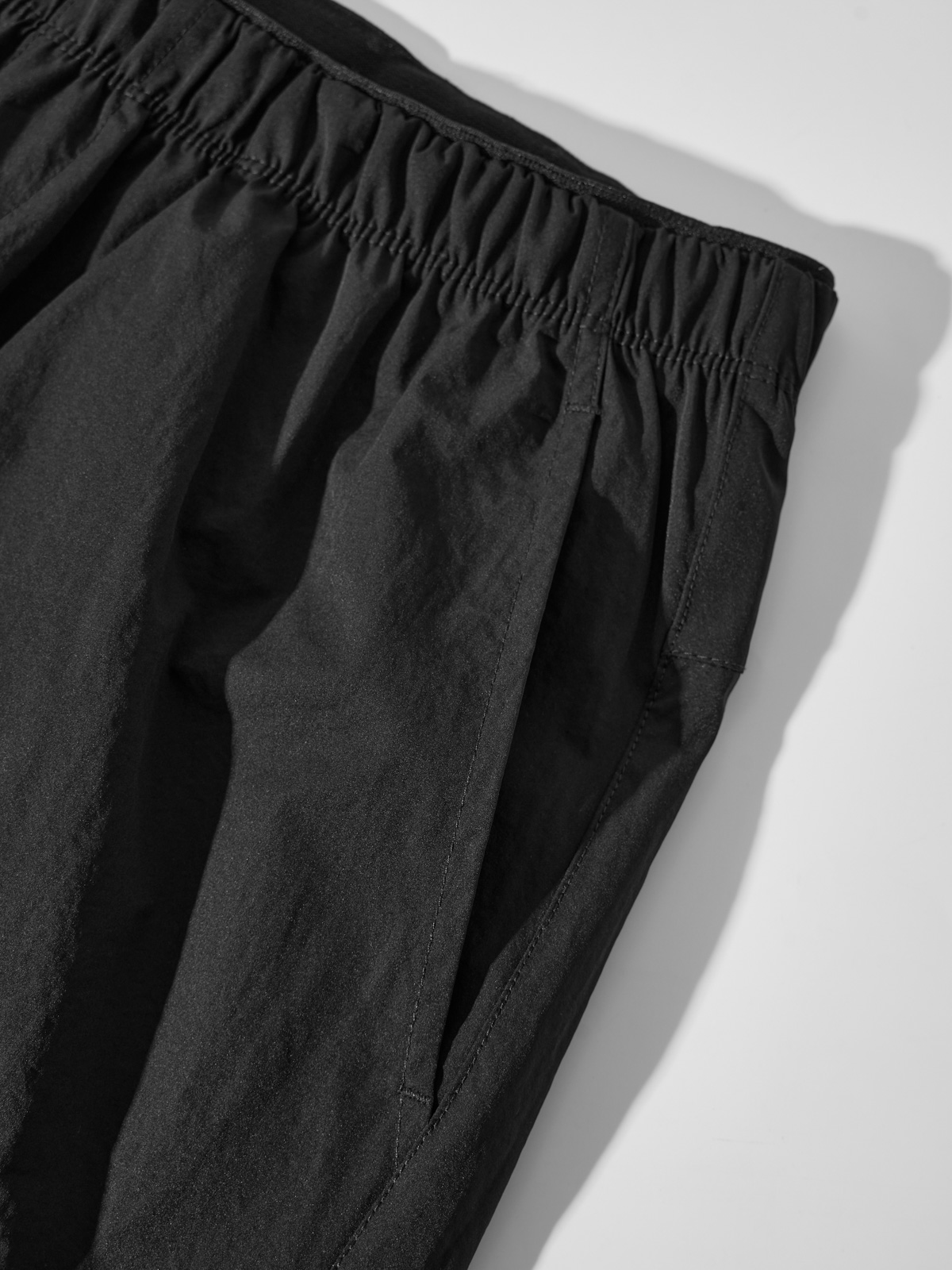 Quần Shorts Gió Thể Thao Nam Chun Ẩn