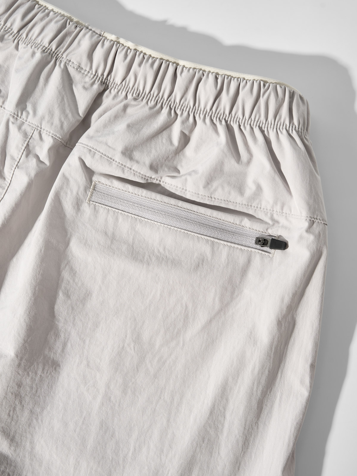 Quần Shorts Gió Thể Thao Nam Chun Ẩn