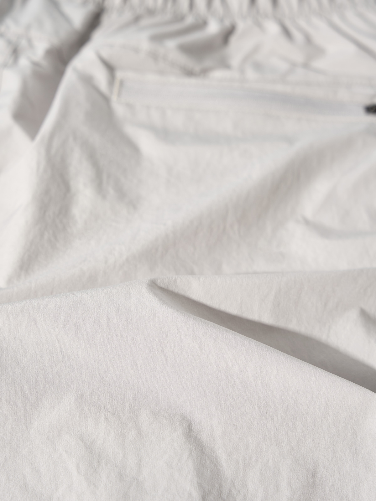 Quần Shorts Gió Thể Thao Nam Chun Ẩn