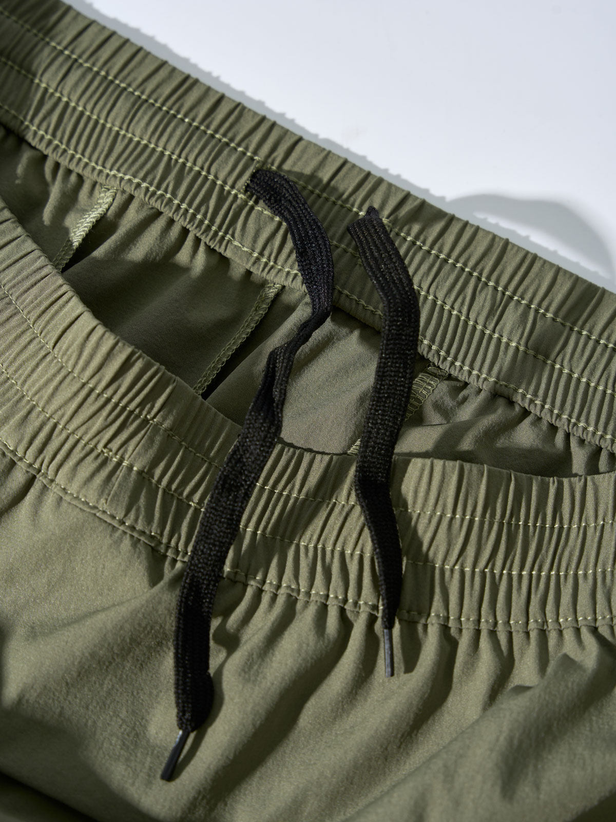 Quần Gió Thể Thao Túi Sườn