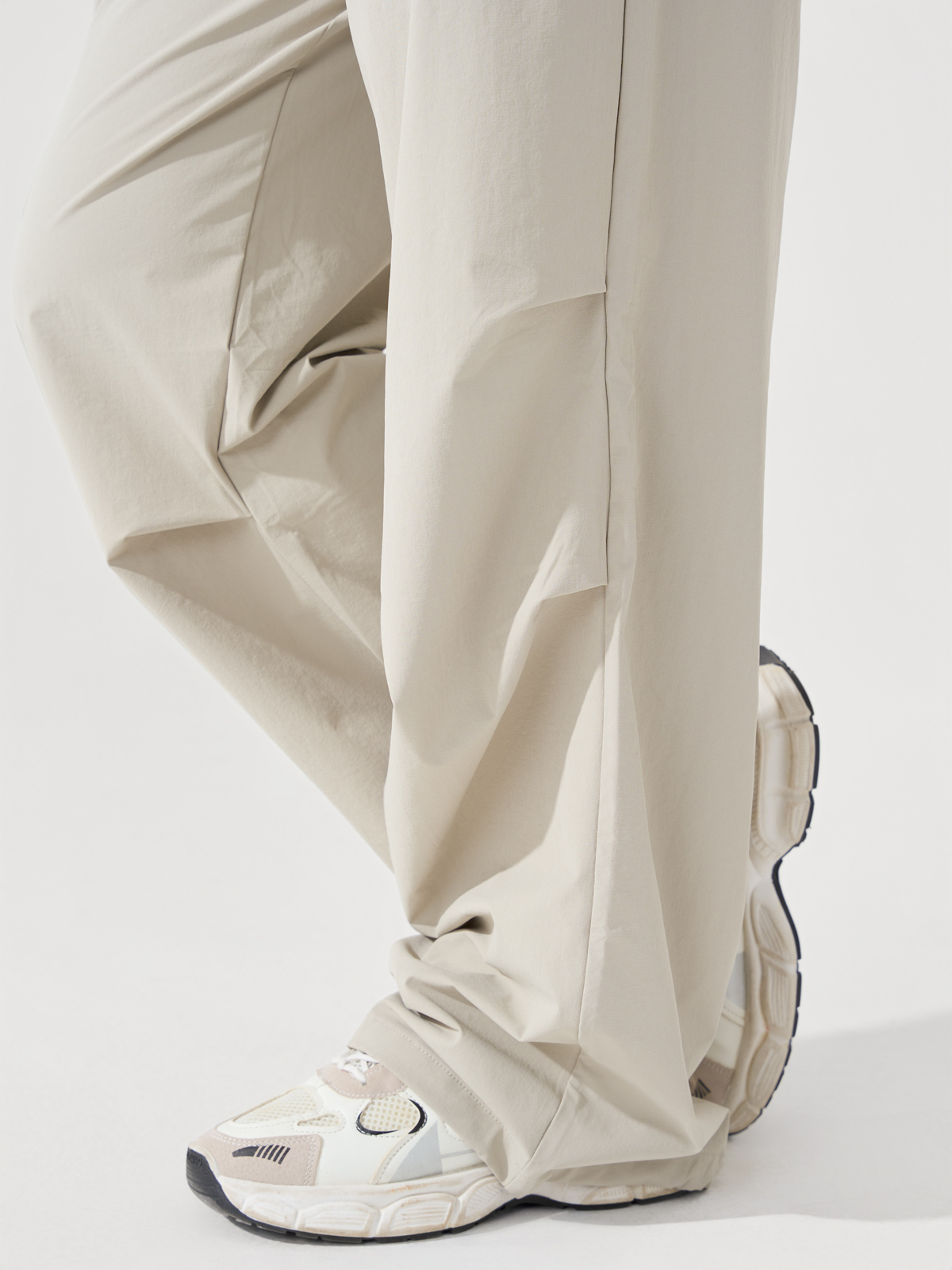 Quần gió dài nữ ống suông phong cách thể thao