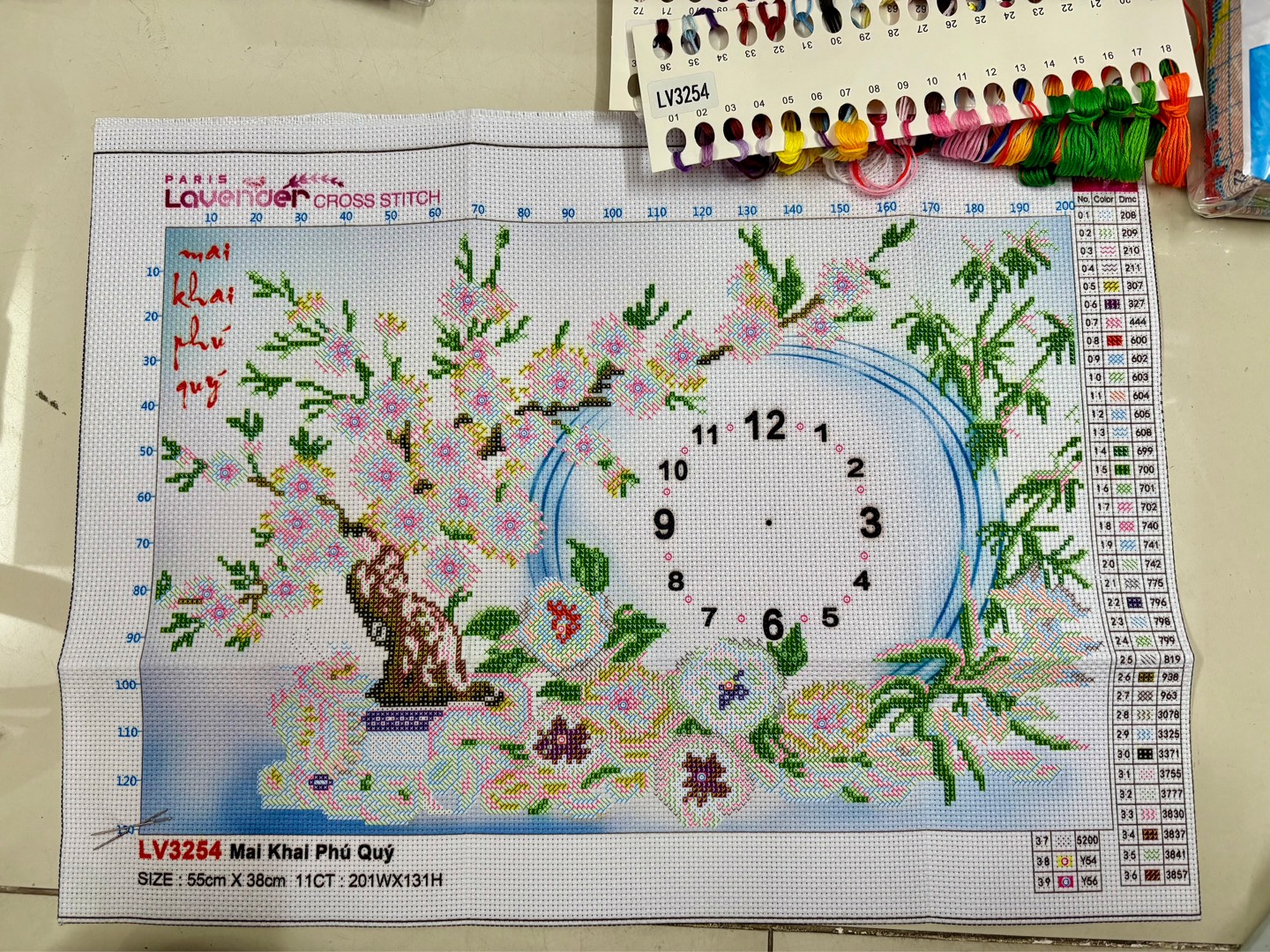 Tranh đồng hồ Cành hoa mai LV3254, kích thước 55x38 cm