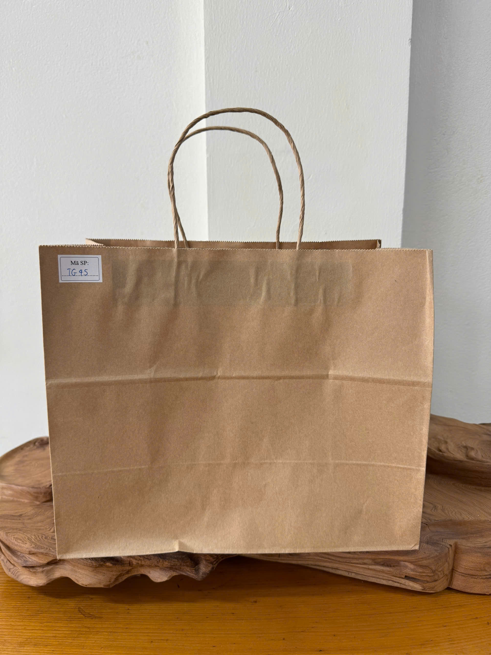 Túi giấy Kraft có quai Màu Nâu - KT: 30x15x25