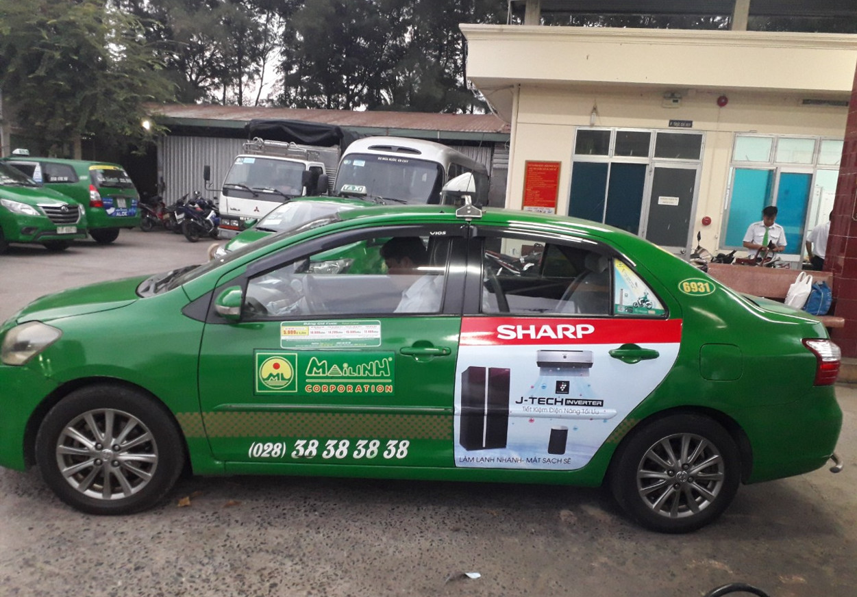 Dán decal xe Taxi