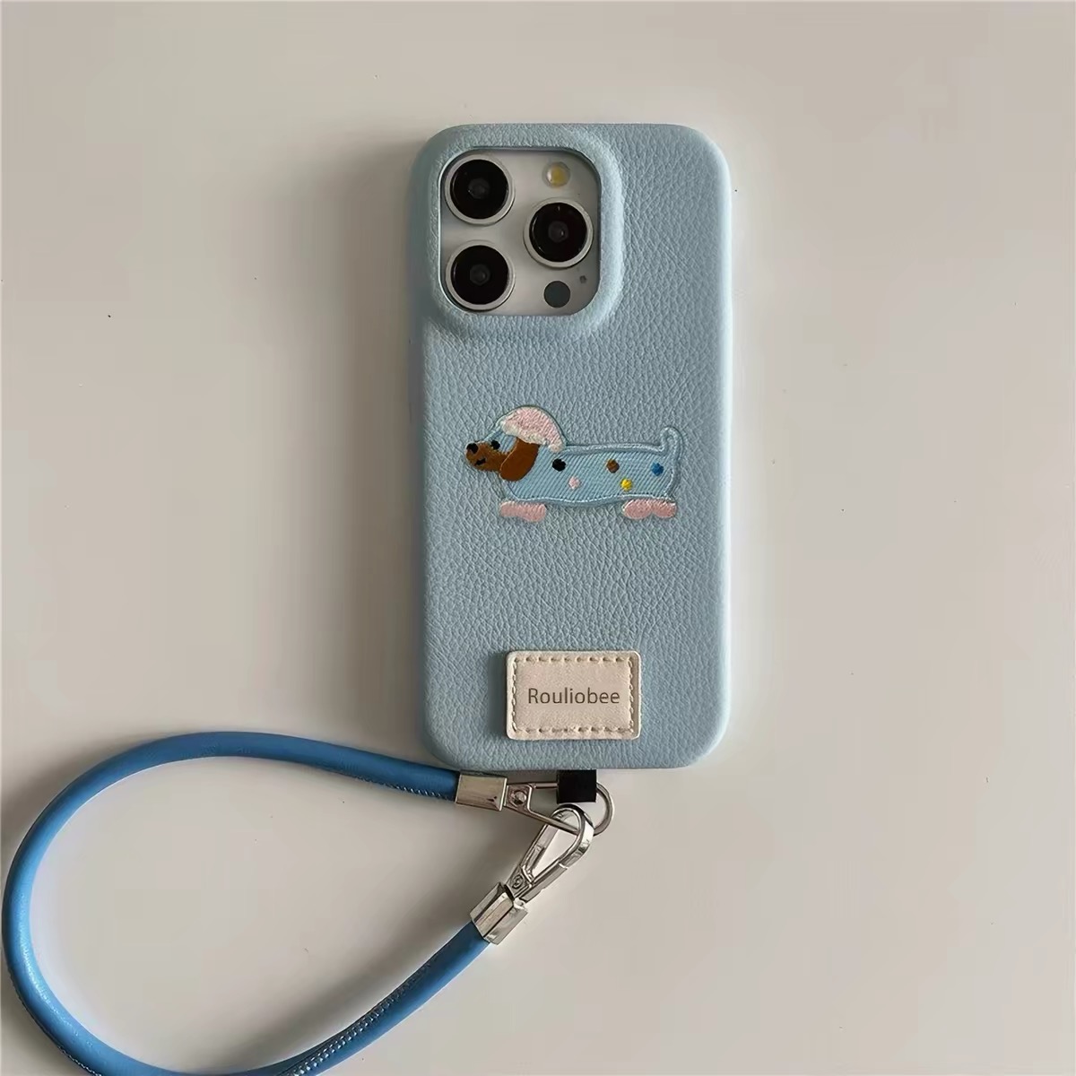 Ốp lưng điện thoại da mềm thêu hình cún kèm dây đeo_O195 (Iphone & Huawei)