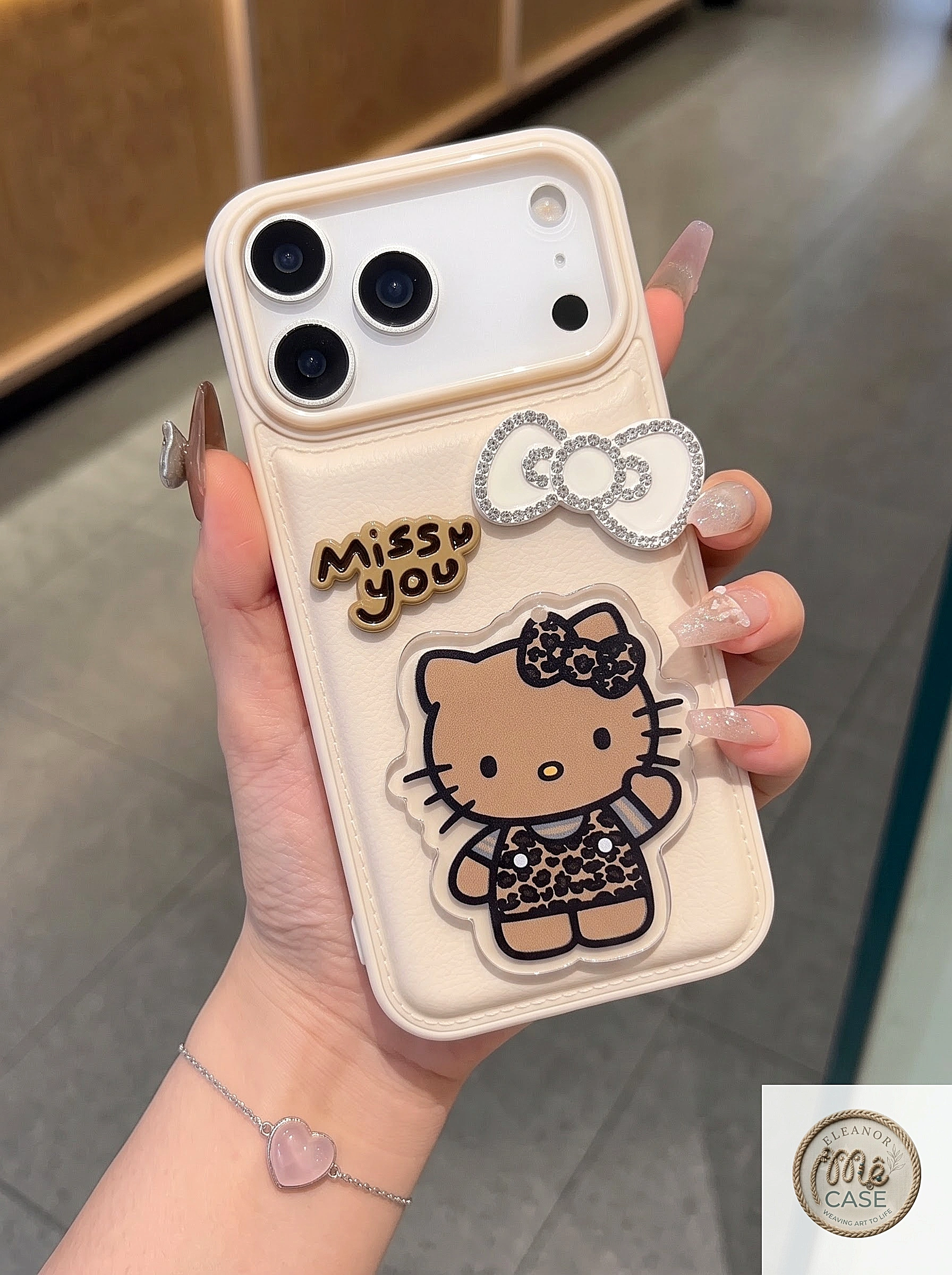 MÃ 86. Ốp Lưng Iphone Kitty Nâu Tây Gắn Nơ Cute